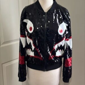 Sequin black, red and white long sleeve jacket, approximately size M.